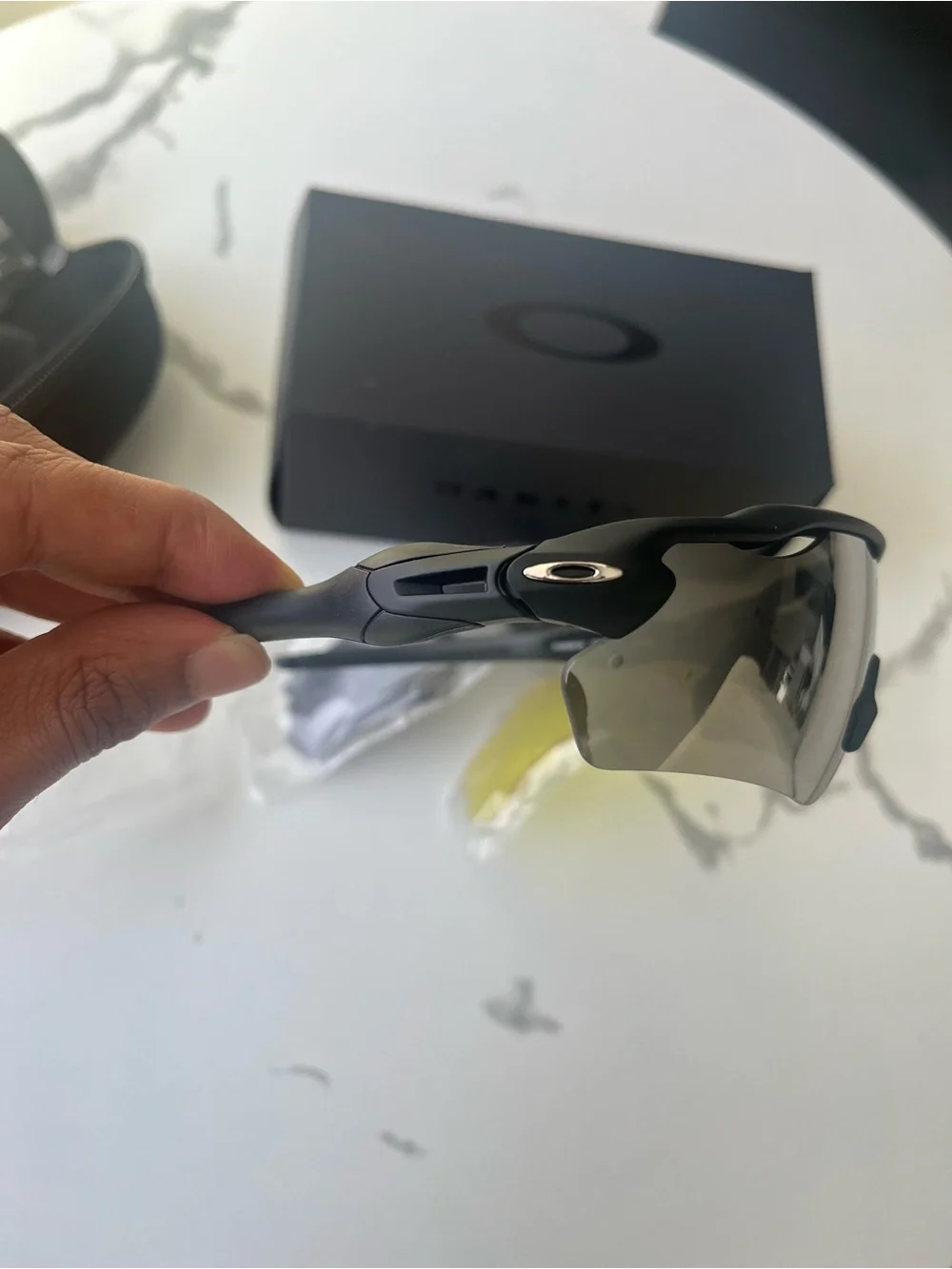 Oakley Black Frame Sunglasses with Silver Mirror Lens